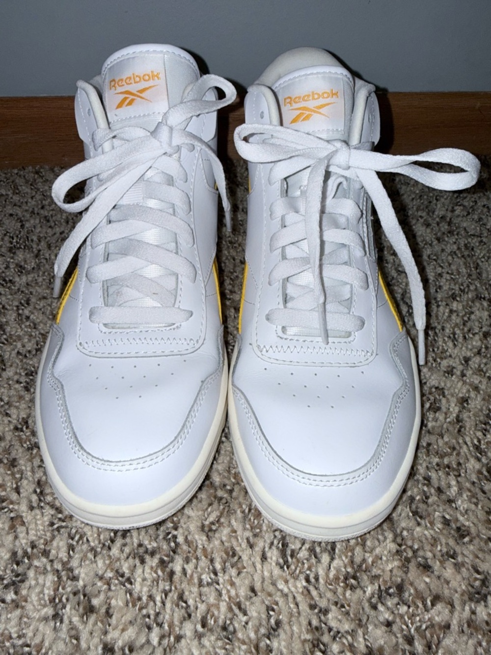 Reebok White High-Top Sneakers with Yellow Logo
